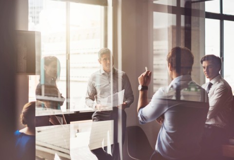 Business people having discussion in board room