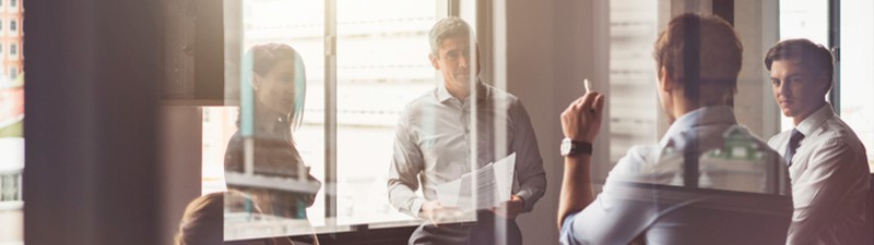Business people having discussion in board room
